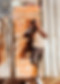 man standing beside gate_edited.jpg